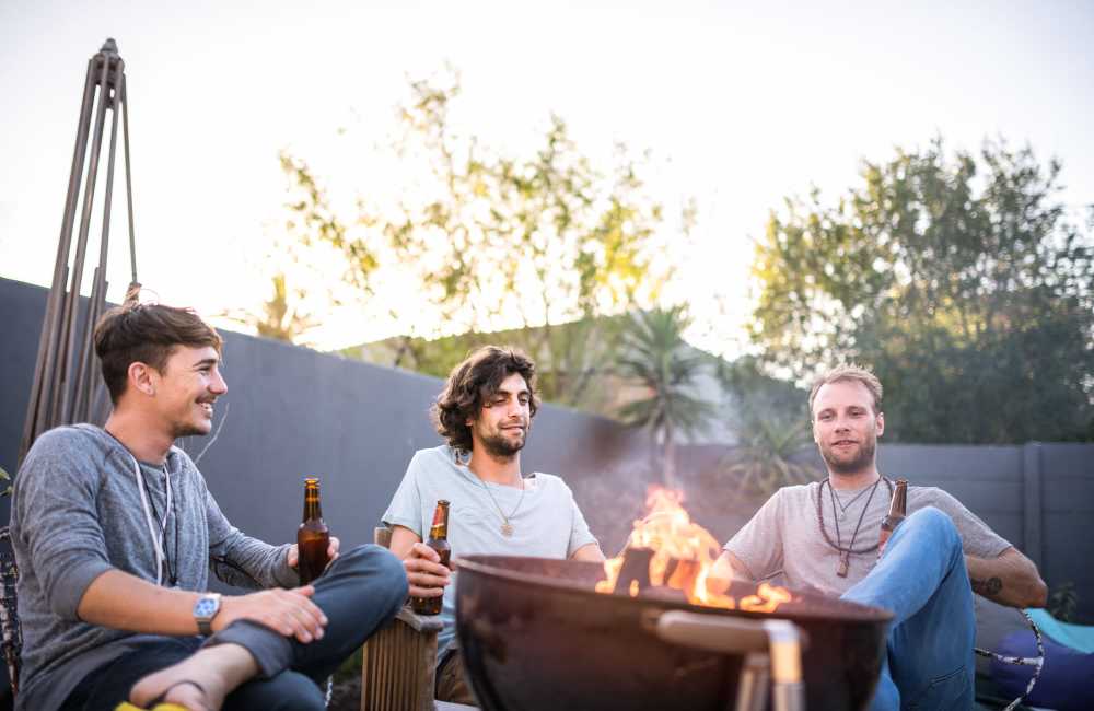 Resident enjoying with friends in the backyard at Comanche Hills in La Mesa, California