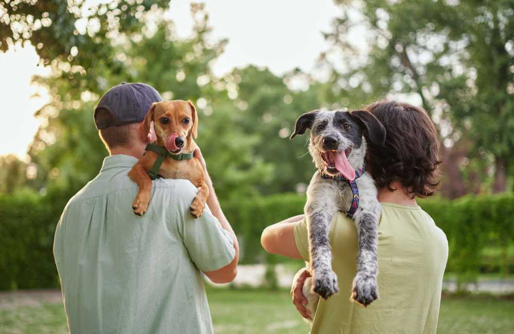 Residents with their pets on shoulder going for walk at Norman Commons in Austin, Texas