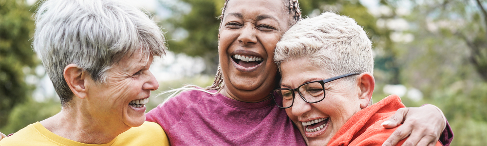 Residents friends embracing and laughing together