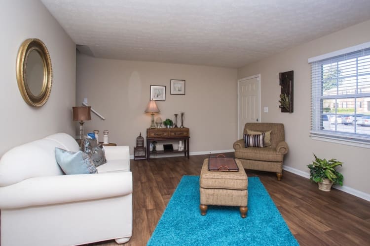 Well-decorated living area in a model home at The Arbors at Smyrna in Smyrna, Georgia