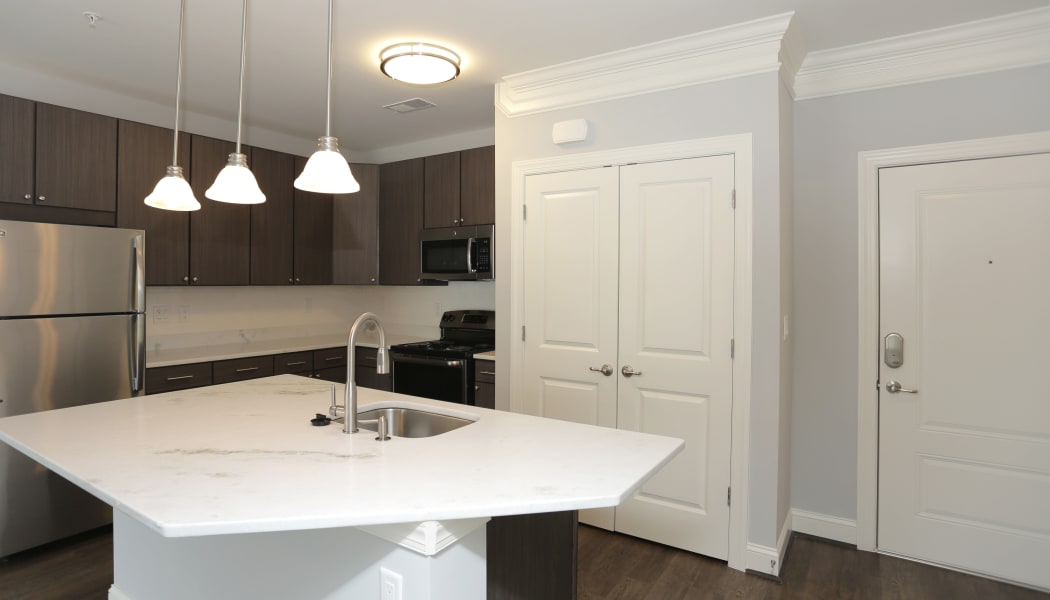 Modern, gourmet kitchen in model home at Aqua on 25th in Virginia Beach, VA