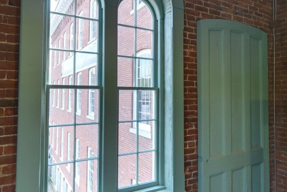 Community view from window at Linwood Mill Apartments in Whitinsville, Massachusetts