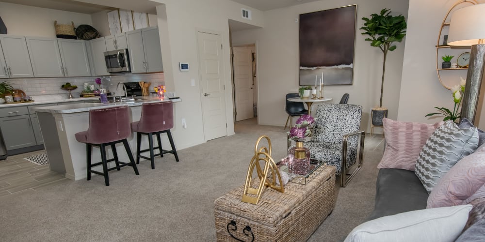 Very spacious carpeted living room at Artisan Crossing in Norman, Oklahoma