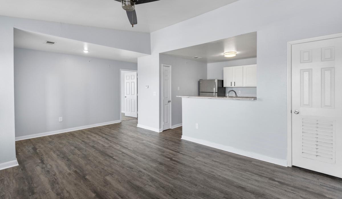Open layout of kitchen and living room at Pebble Brooke Apartments in Milford, Ohio