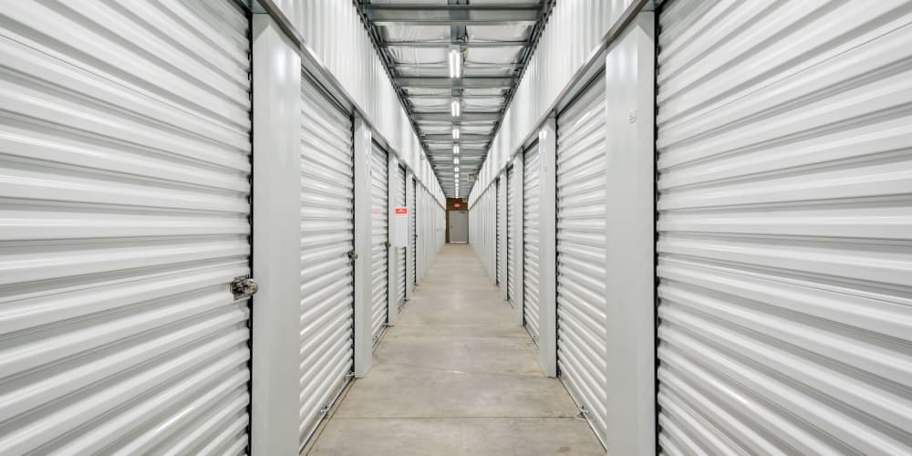 Indoor storage units in a clean hallway at Trojan Storage of Bend in Bend, Oregon