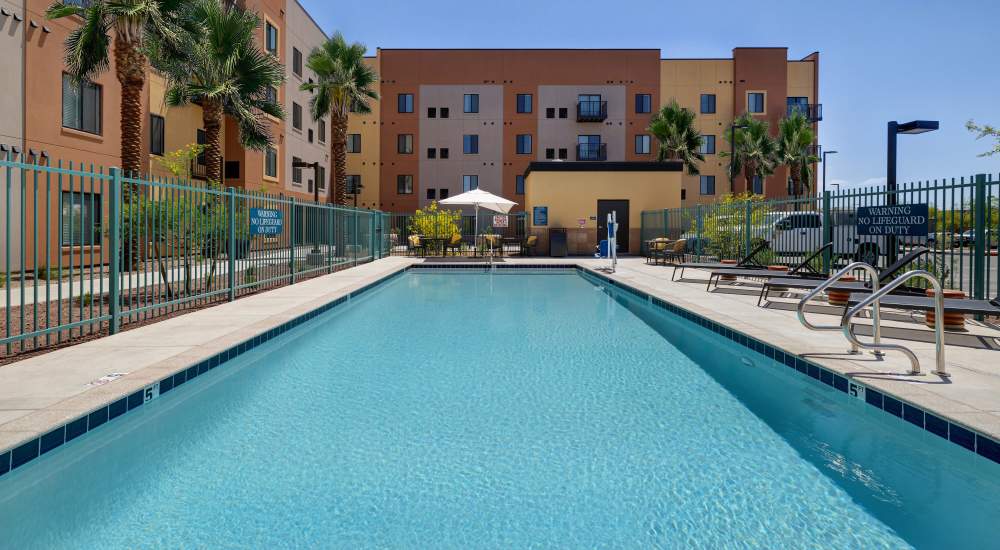 Sparkling Swimming pool and view of the exterior at WaterWalk Phoenix - North Happy Valley in Phoenix, Arizona 