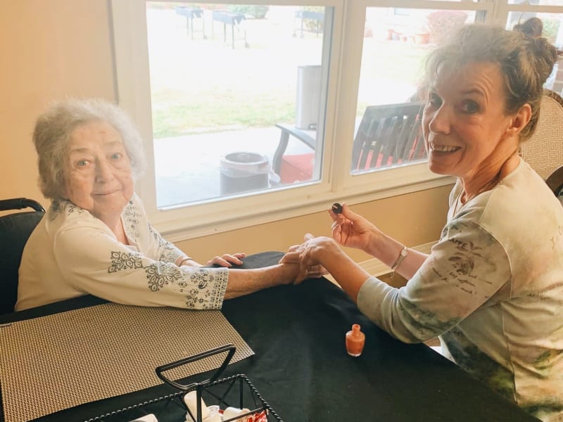A resident getting her nails done at English Meadows Lexington Campus in Lexington, South Carolina