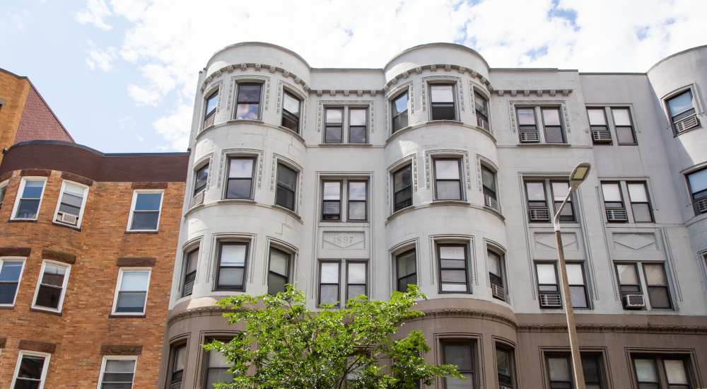 Exterior view of the apartment with surrounded by trees at 71 Westland Apartments in Boston, Massachusetts