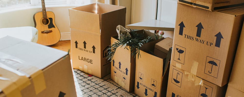 Boxes in a packed home near Neighborhood Self Storage