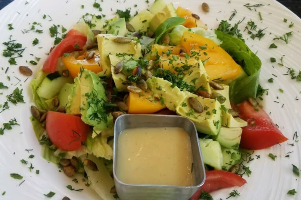 Delicious salad with avocado and tomatoes