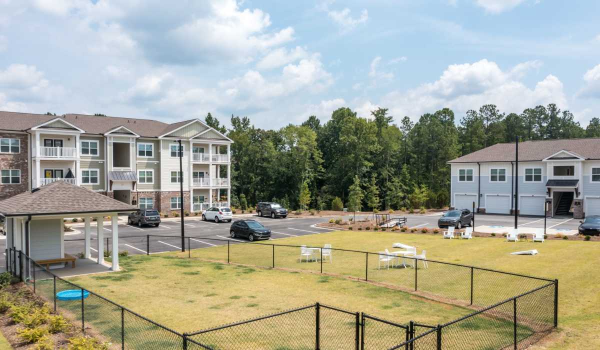 Community building with fenced green space at Lullwater at Riverwood in Evans, Georgia