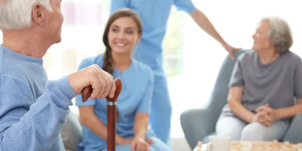 Cargivers and residents talking at Montello Care Center in Montello, Wisconsin