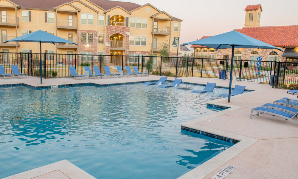 Sparkling resort-style swimming pool at Portico at Friars Creek Apartments in Temple, Texas