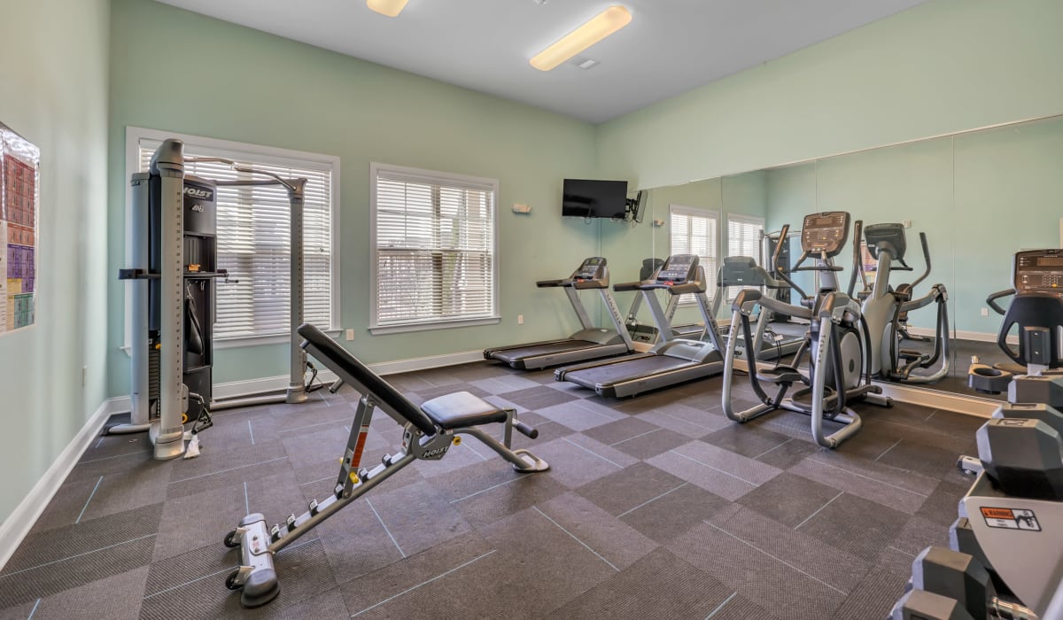 Workout in our fitness center with weights at The Maddox in Centerton, Arkansas
