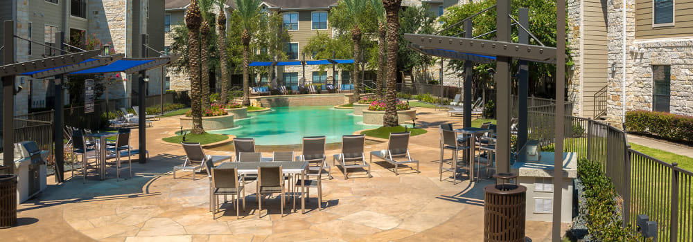 The sundeck with plenty of seating at Sommerall Station Apartments in Houston, Texas