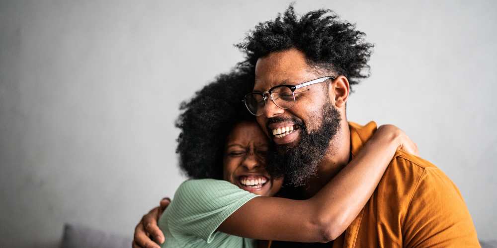Happy couple in their home at The Gallery On Wells in Chicago, Illinois