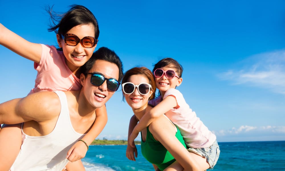 Resident family at the beach nearby at Westshore Palms in Panama City, Florida