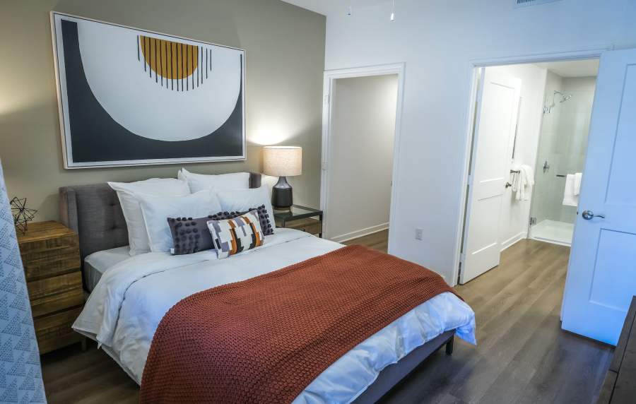 Elegant minimalist bedroom at The Courtyards Pacific Village in San Diego, California