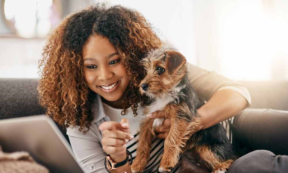 Resident and her pup hanging out in their new home at Beacon Station in Augusta, Georgia