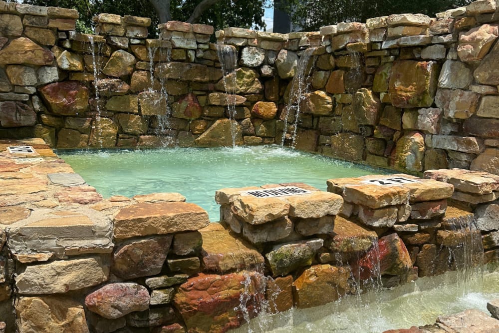 A beautiful rock fountain at Walnut Ridge in Arlington, Texas