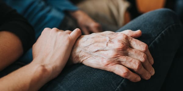 Caretaker comforting a resident at Wellington Meadows in Fort Atkinson, Wisconsin