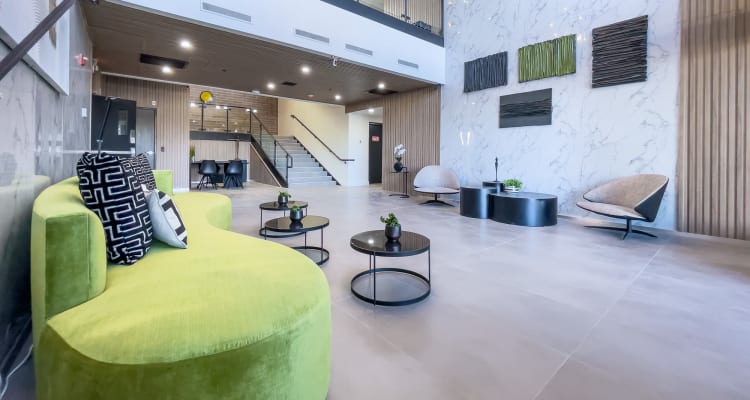 Resident lounge area with lots of comfy seating at The Charleston Apartments in Phoenix, Arizona