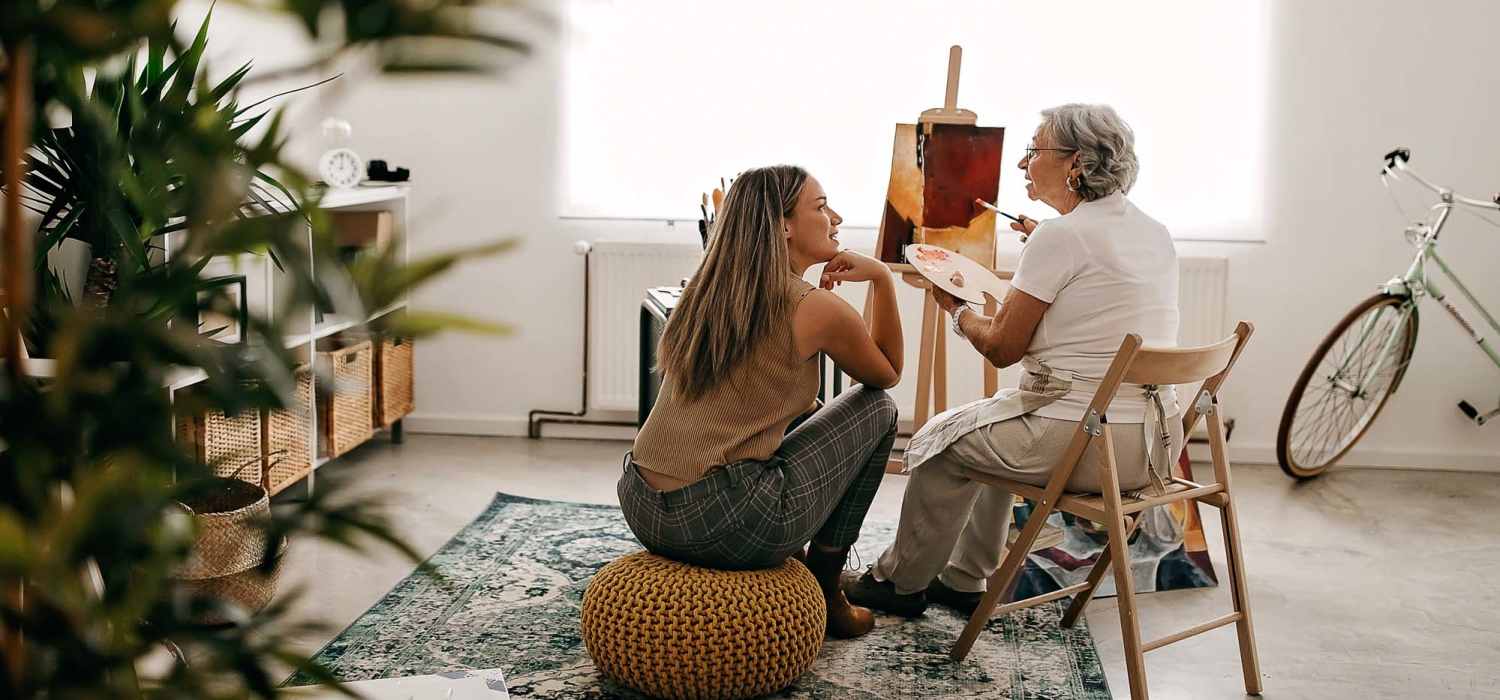 Resident painting at Farrington Trace Senior in Greenville, North Carolina