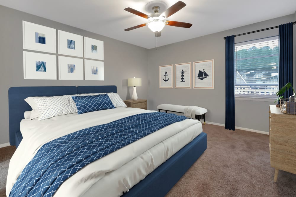 Bedroom with plush carpet at The Reserve at Red Bank Apartment Homes in Chattanooga, Tennessee