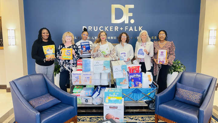 Group of people donating diapers for kids