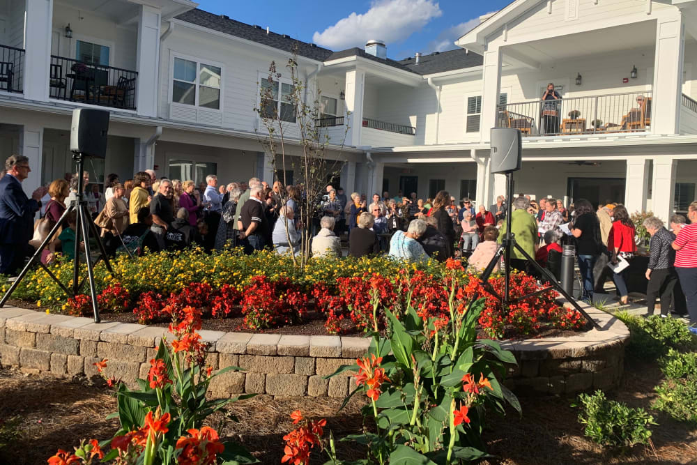 Residents and staff gathered for the ribbon cutting event outside of The Blake at Kingsport in Kingsport, Tennessee