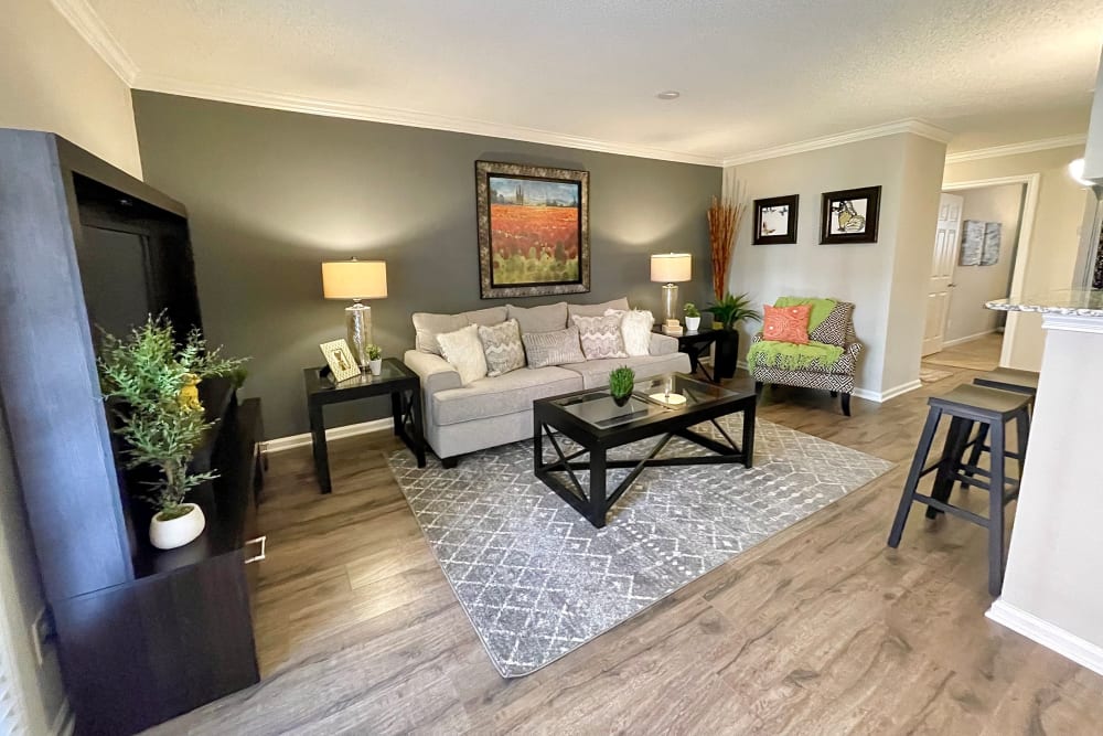 Spacious living room at The Abbey at Montgomery Park in Conroe, Texas