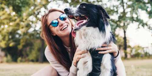 Resident taking her dog for a walk near Villas at Emerald Park in Gretna, Louisiana