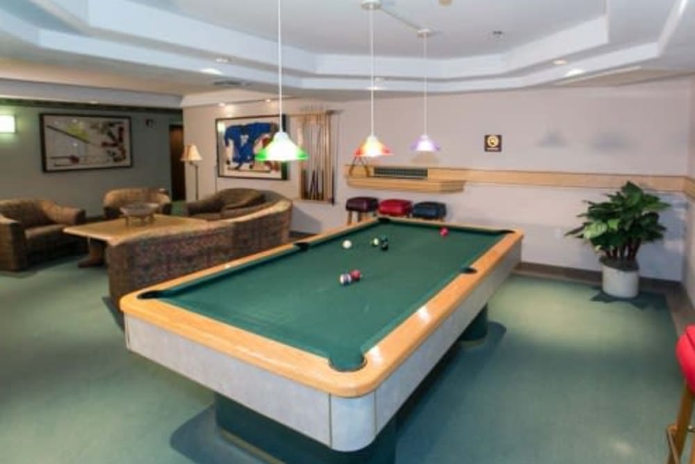 Game room with pool table at Las Fuentes Resort Village in Prescott, Arizona