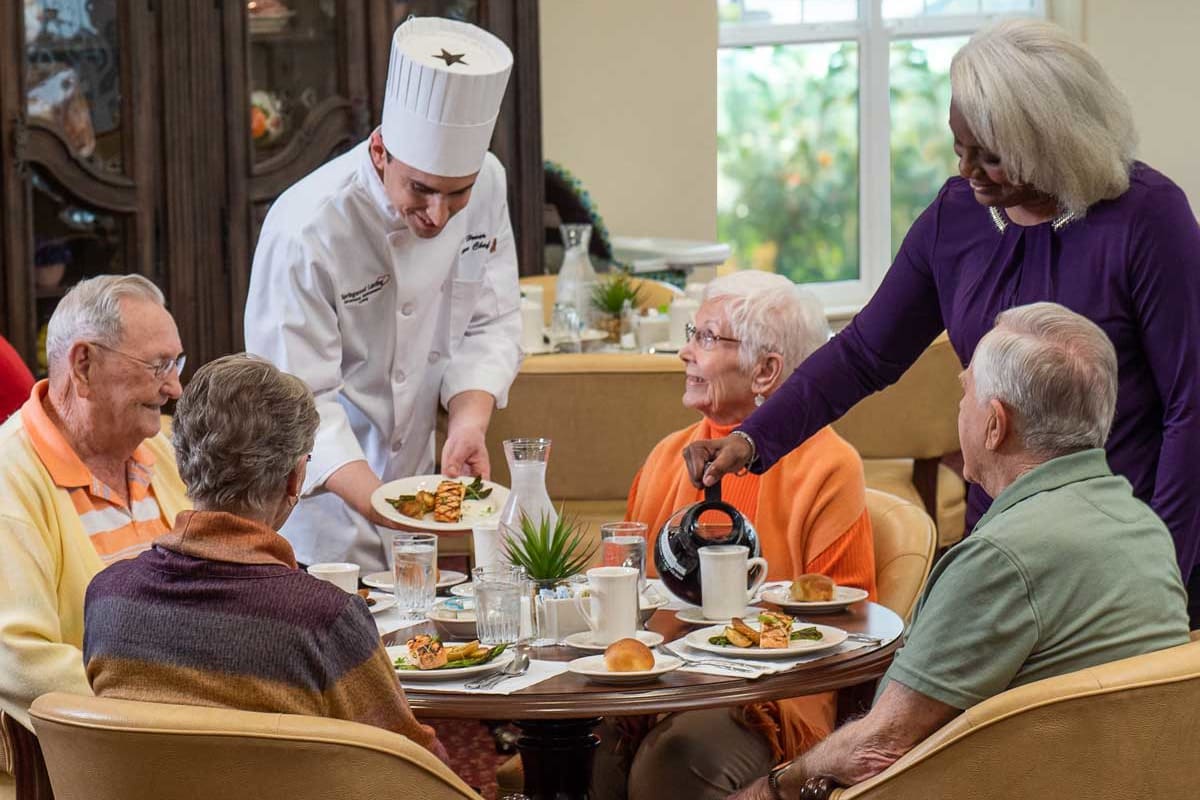 Residents of Hawthorn Senior Living in Vancouver, Washington being served a meal