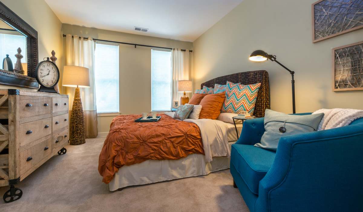 Spacious bedroom with large windows at Promenade Pointe, Norfolk, Virginia