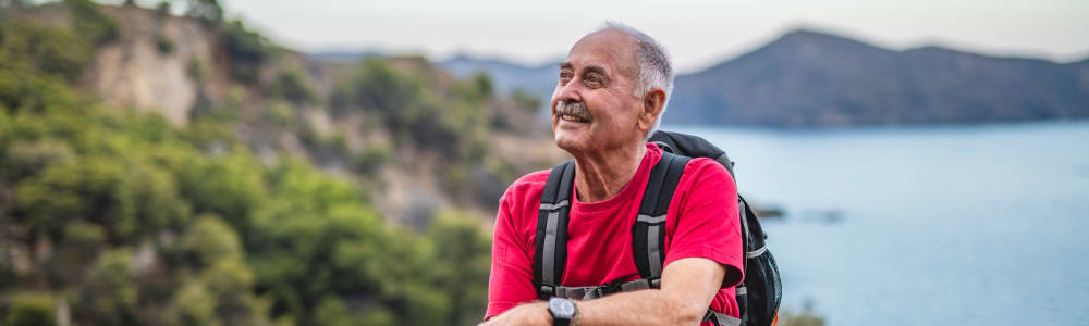 Resident hiking and enjoying the outdoors near a lake