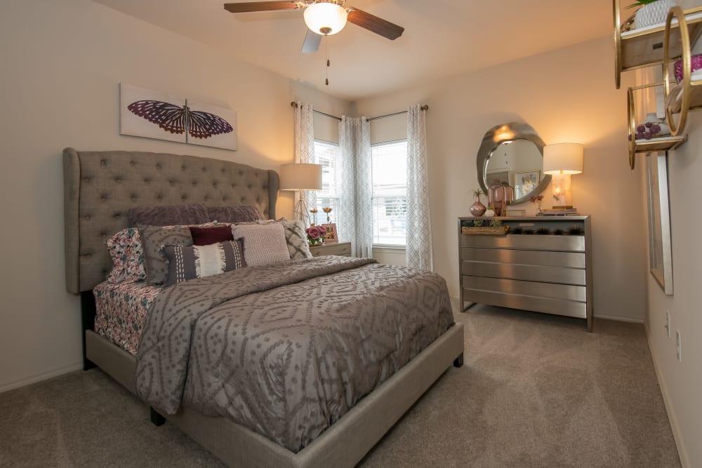 Master bedroom at Bend at New Road Apartments in Waco, Texas