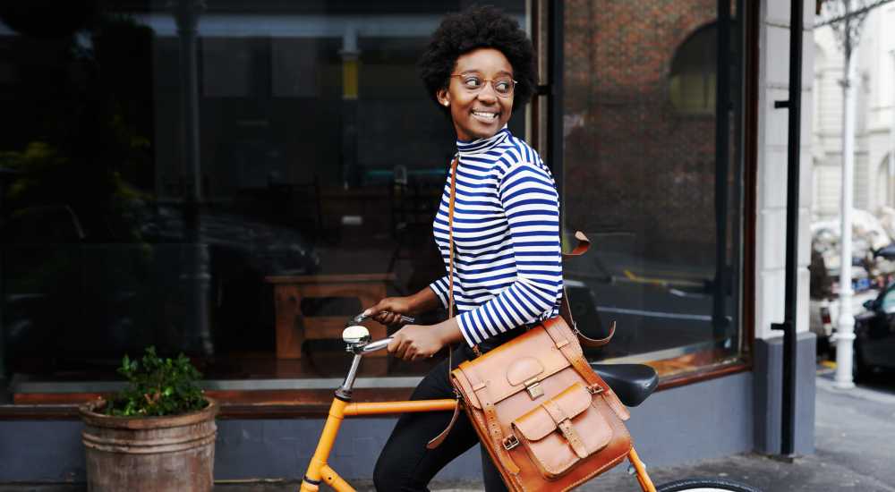 Resident riding bike near The Simone in Silver Spring, Maryland 