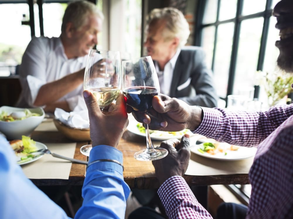 Residents enjoying drinks together at Touchmark Central Office in Beaverton, Oregon