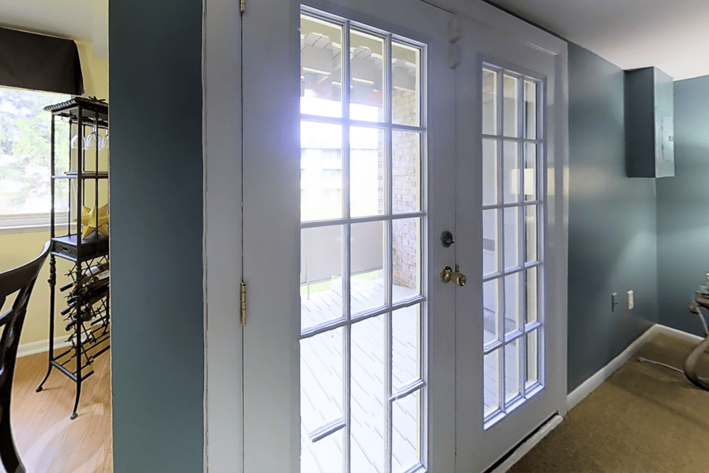 Doors to balcony at Tuscany Woods Apartments in Windsor Mill, Maryland
