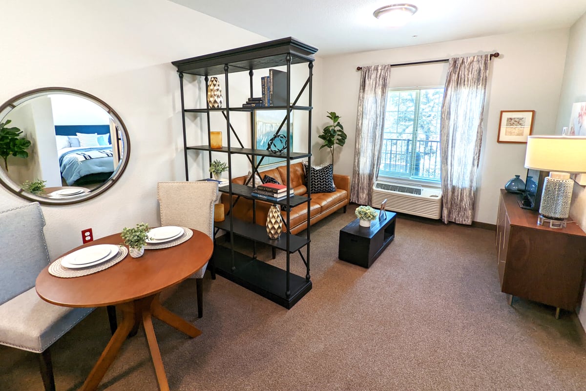 Senior living apartment bedroom at Almond Heights in Orangevale, California