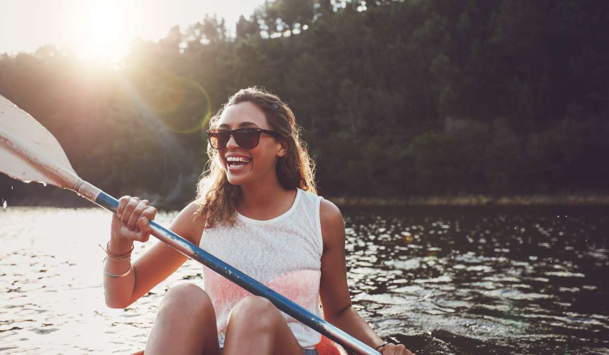 A woman kayaking on a lake near Seaton Preserve in Jacksonville, Florida