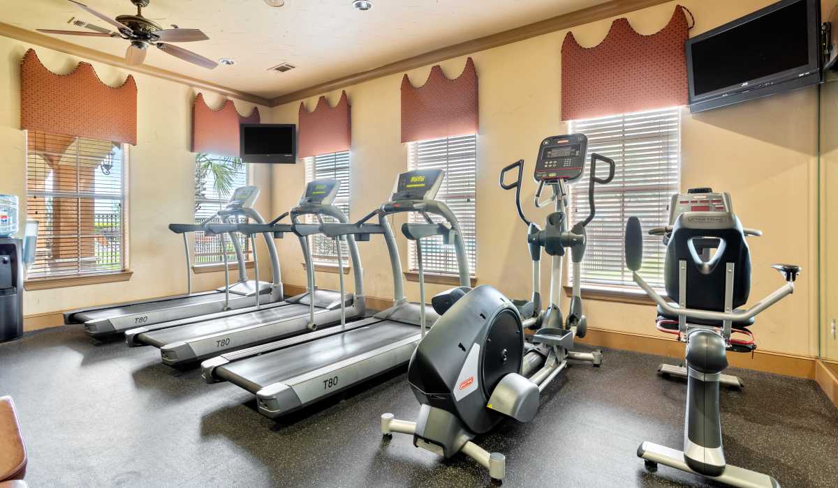 Well equipped fitness center at Park Avenue at Boulder Creek in Houston, Texas