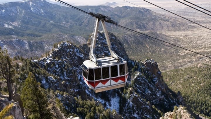 Perspective view down cables of Sandia Peak Tramway in New Mexico near Olympus Encantada Apartments