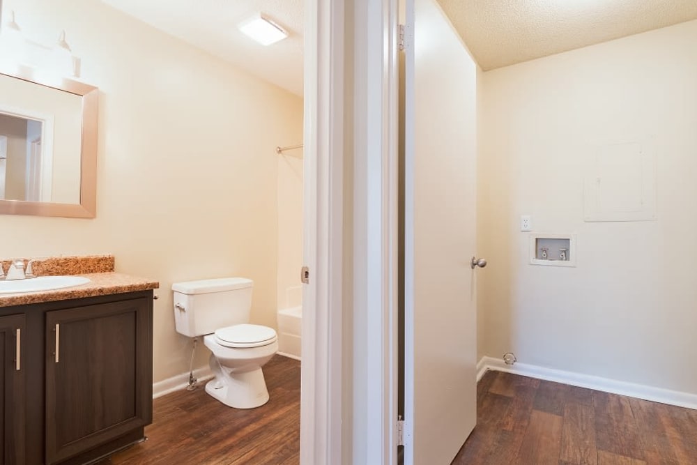 Bathroom and hallway layout at The Hills at Oakwood Apartment Homes in Chattanooga, Tennessee