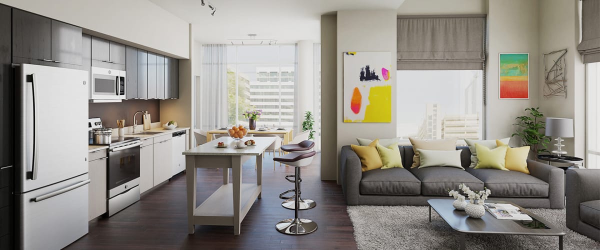 Modern apartment living room and kitchen at Solaire 8250 Georgia in Silver Spring, Maryland