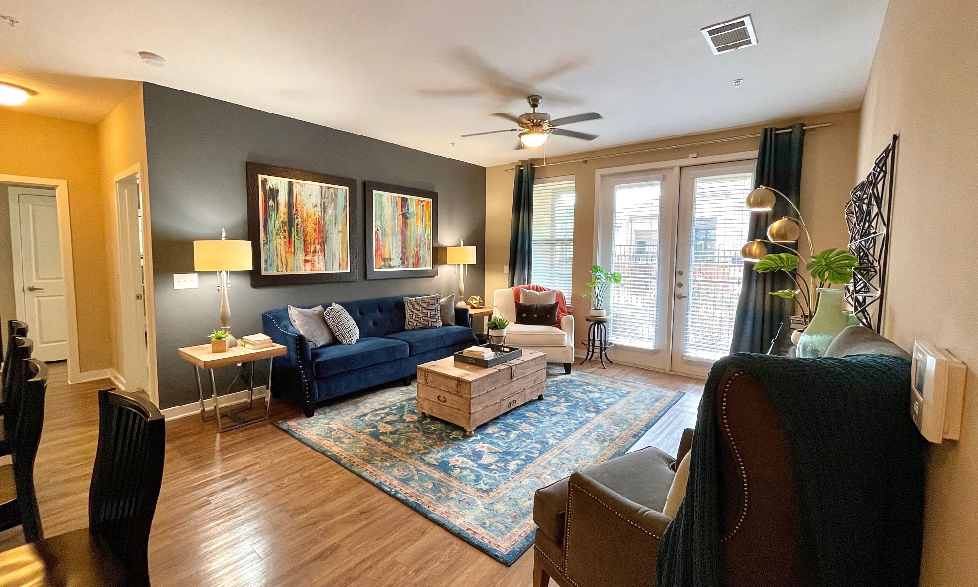 Spacious living room at an apartment at The Abbey at Spring Town Center in Spring, Texas