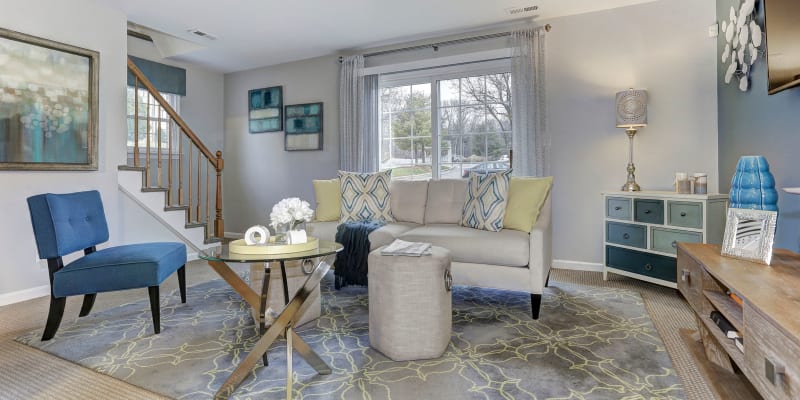 Model living room and staircase at Olde Forge Townhomes in Perry Hall, Maryland