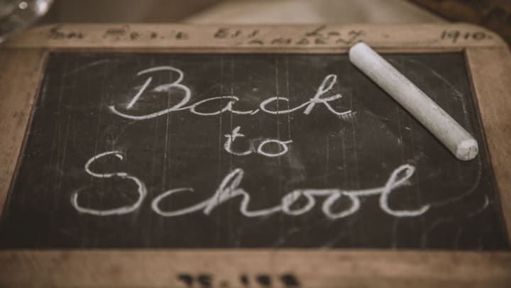 "Back to School" written on a chalkboard 