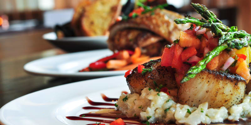 Plates of food at a restaurant near The Village at Serra Mesa in San Diego, California